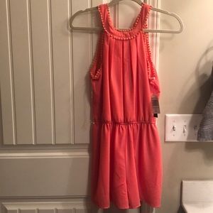Coral romper. New with tags.